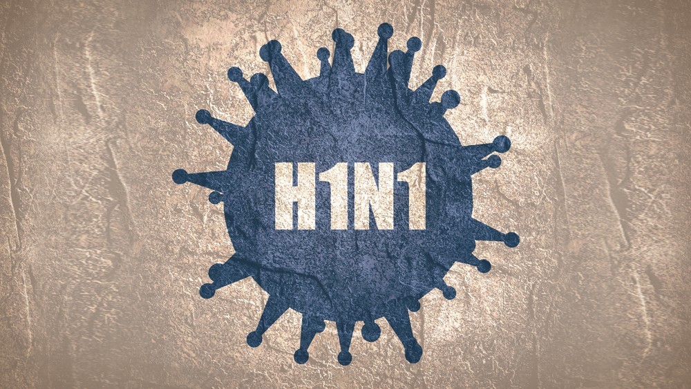 Ilustração de um vírus azul e H1N1 escrito dentro do vírus. sobre uma textura de papel amassado.