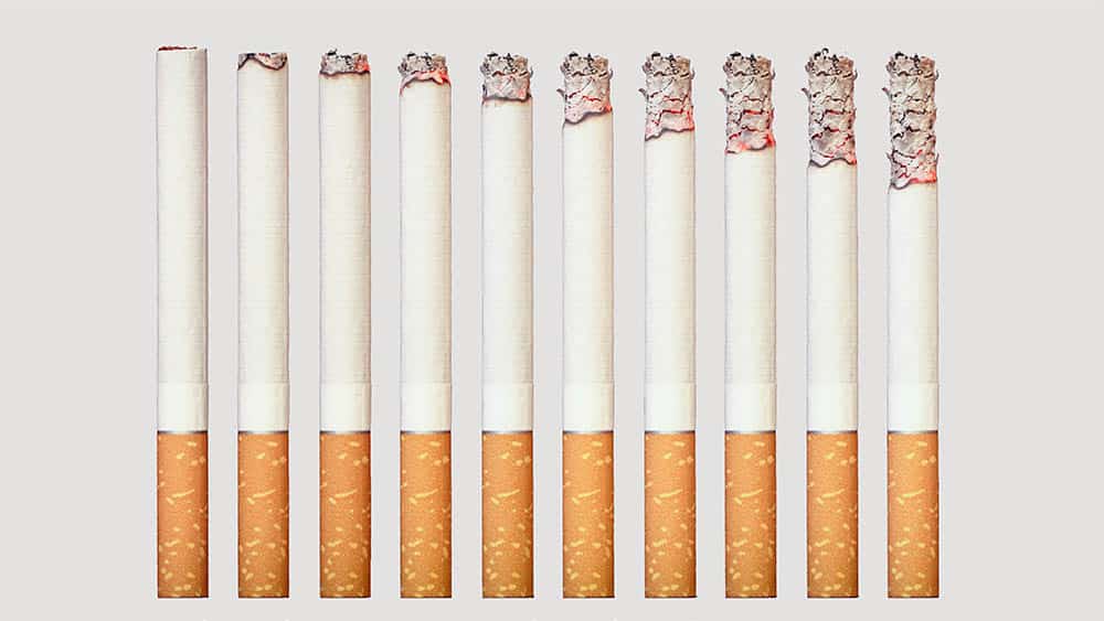 Teste seu grau de dependência de nicotina Cigarros lado a lado cada um com a ponta mais queimada que o anterior.